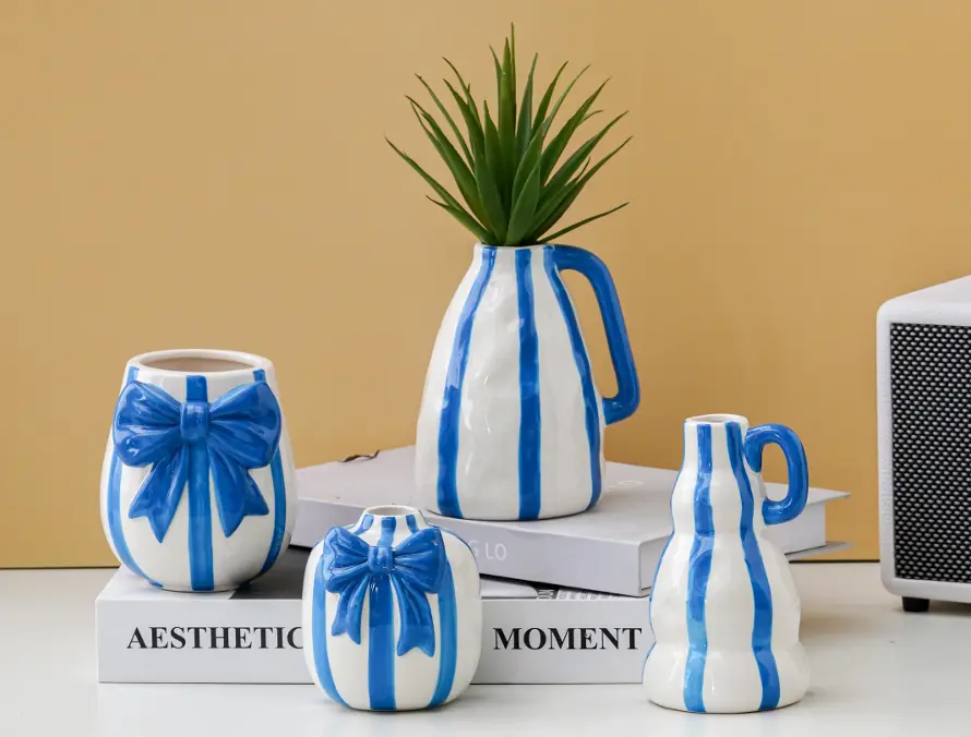 Hand painted ceramic vases with unique artisan patterns for boutique home décor collections