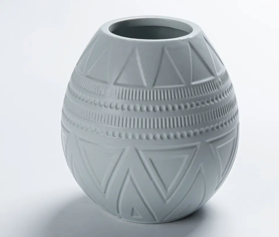 geometric texture vases with sculptural surface patterns