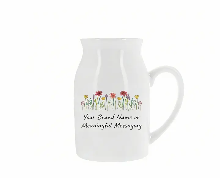 Personalised white ceramic milk jug-style vase with wildflower illustration, customisable with your brand name or meaningful messaging, ideal for gifting and home decor