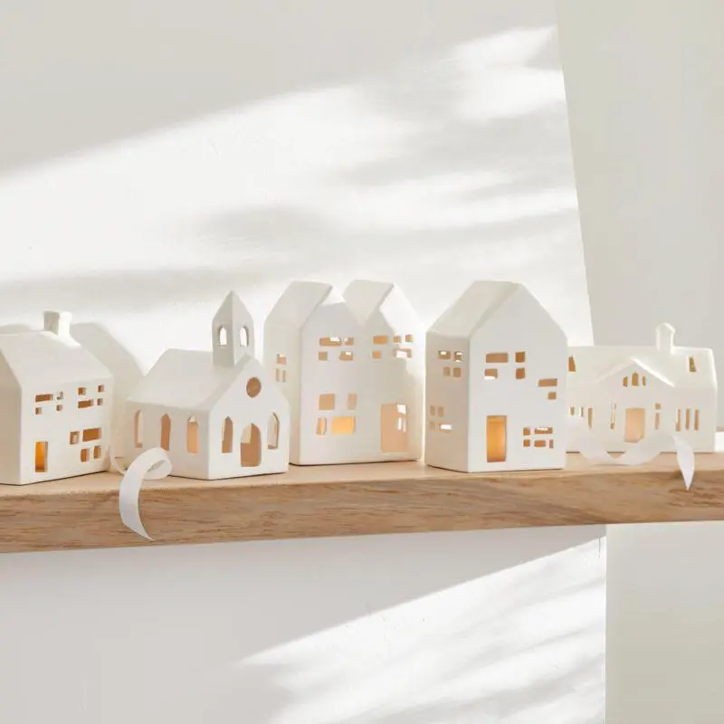 white ceramic houses year round home decor